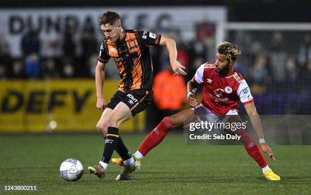 Louth , Ireland - 7 October 2022; John Martin of Dundalk in action against Barry Cotter of St Patrick's Athletic during the SSE Airtricity League...