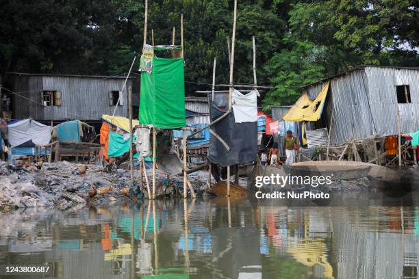 View of a slum where internal migrant people live in Dhaka, Bangladesh on October 07, 2022. According to World Bank, each year up to half million...