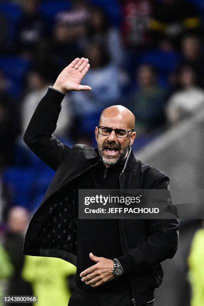 Lyon's Dutch head coach Peter Bosz gestures during the French L1 football match between Olympique Lyonnais and Toulouse at The Groupama Stadium in...