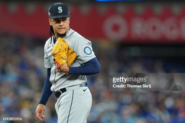 Luis Castillo of the Seattle Mariners pitches in the third inning during the Wild Card Series game between the Seattle Mariners and the Toronto Blue...