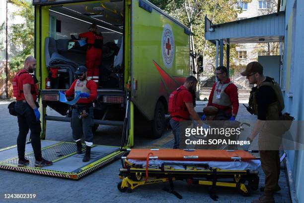 Tamara Krasnobaeva, 79 is seen with the Red Cross Ukraine volunteers during an evacuation from the hospital in Sloviansk to the western regions of...