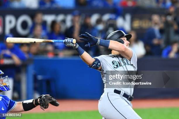 Seattle Mariners Catcher Cal Raleigh hits a homerun during the first inning of the MLB baseball postseason Wild Card game 1 between the Seattle...