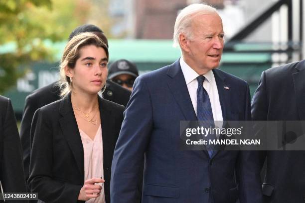 President Joe Biden walks to the University of Pennsylvania bookstore with granddaughter Natalie Biden during a visit to the campus in Philadelphia...