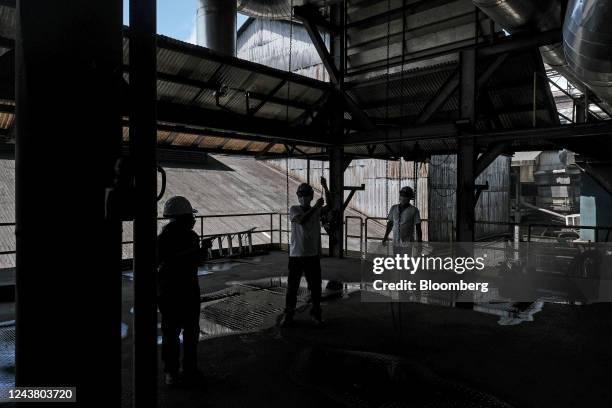 Workers inside Victorias Milling Company Inc. Sugar refinery in Victorias City, Negros Occidental, the Philippines, on Thursday, Oct. 6, 2022....