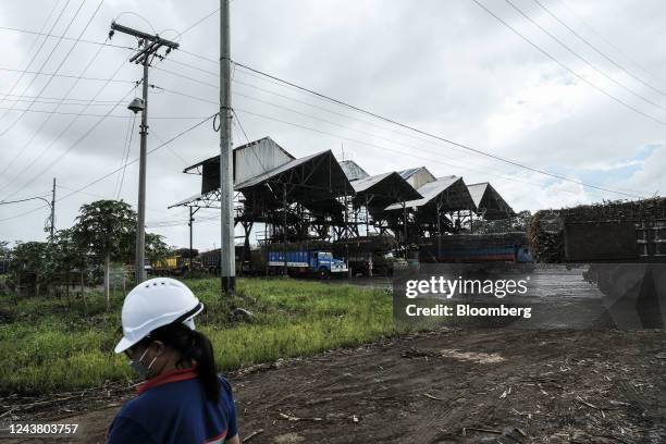 Trucks loaded with sugarcane inside Victorias Milling Company Inc. Sugar refinery in Victorias City, Negros Occidental, the Philippines, on Thursday,...