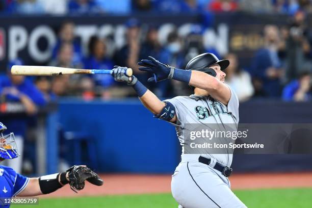 Seattle Mariners Catcher Cal Raleigh hits a homerun during the first inning of the MLB baseball postseason Wild Card game 1 between the Seattle...