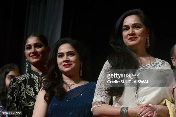In this picture taken on October 7 playback singers Pratibha Singh Baghel , Bela Shende actress. Padmini Kolhapure attend a tribute event to the late...