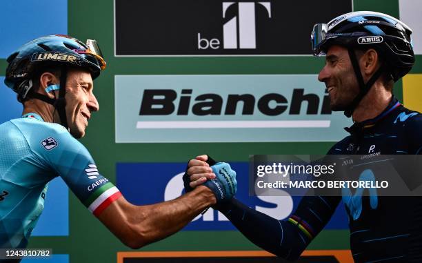 Team Astana's Italian rider Vincenzo Nibali and Team Movistar's Spanish rider Alejandro Valverde pose as they participate to their last professional...