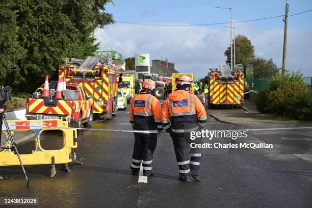 Emergency services attend the scene following an explosion at a petrol station in Donegal on October 8, 2022 in Creeslough, Ireland. The explosion...