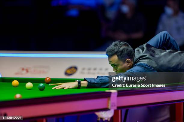 October 2022: Marco Fu of Hong Kong plays a shot during Hong Kong Masters 2022 Semi Final match between Marco Fu of Hong Kong and John Higgins of...