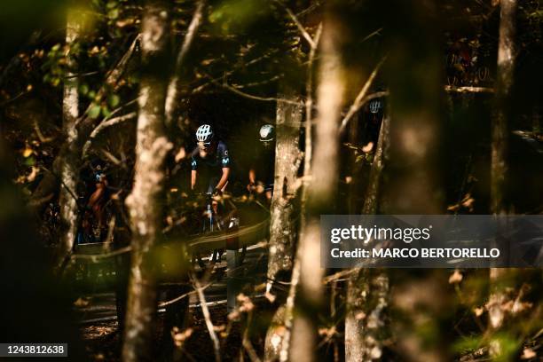 The pack rides during the 116th edition of the Giro di Lombardia , a 252,42 km cycling race from Bergamo to Como on October 8, 2022.