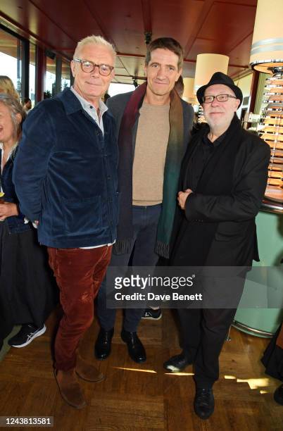 Stephen Daldry, Kris Thykier and Colin Vaines attend the Netflix Awards Brunch during the 66th BFI London Film Festival at 180 The Strand on October...