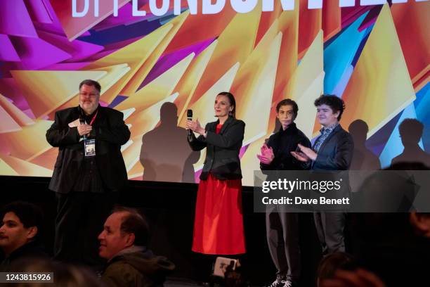 Justin Johnson, Nora Twomey, Jacob Tremblay and Gaten Matarazzo onstage during a Q&A at the Premiere Screening of "My Father's Dragon" during the...