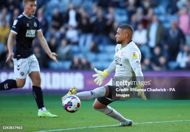 Middlesbrough goalkeeper Zack Steffen makes a save from Millwall's Andreas Voglsammer during the Sky Bet Championship match at The Den, London....