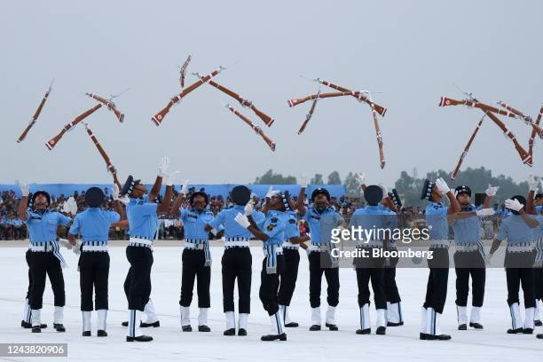 Indian Air Force personnel perform a rifle drill during the Indian Air Force Day at Indian Air Force station, in Chandigarh, India, on Saturday, Oct....