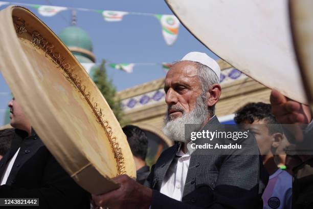 Muslims gather to attend a religious ceremony within the celebrations for Mawlid al-Nabi, the birth anniversary of Muslims' beloved Prophet Mohammad,...