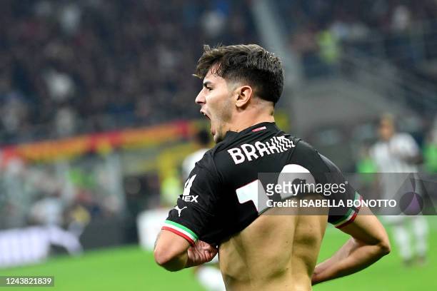 Milan's Spanish midfielder Brahim Diaz celebrates scoring his team's second goal during the Italian Serie A football match between AC Milan and...