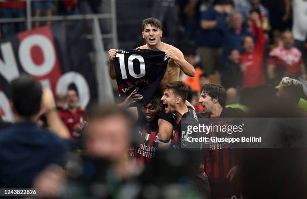 Brahim Abdelkader Diaz of AC Milan celebrates with teammates after scoring goal 2-0 during the Serie A match between AC MIlan and Juventus at Stadio...