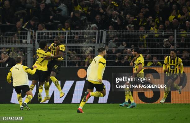 Dortmund's French forward Anthony Modeste celebrates his 2-2 during the German first division Bundesliga football match between BVB Borussia Dortmund...