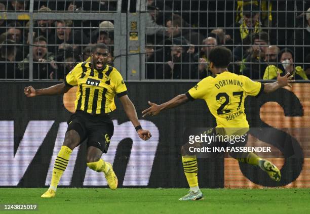 Dortmund's French forward Anthony Modeste celebrates his 2-2 during the German first division Bundesliga football match between BVB Borussia Dortmund...