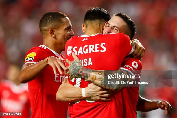 Peter Musa of SL Benfica celebrates after scoring his team's fourth goal with teammates during the Liga Portugal Bwin match between SL Benfica and...