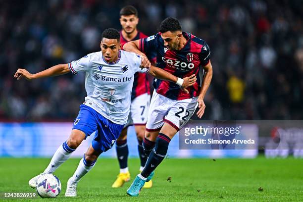 Abdelhamid Sabiri of Sampdoria and Charalampos Lykogiannis of Bologna vie for the ball during the Serie A match between Bologna FC and UC Sampdoria...