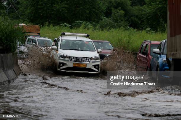 Waterlogged after rain at Sarita Vihar Apollo hospital road, on October 8, 2022 in New Delhi, India. Heavy rains are lashing parts of Delhi leading...