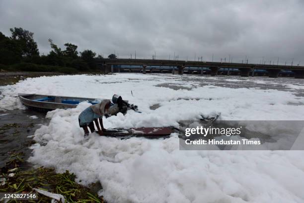 Thick layer of toxic polluted foam in Yamuna River near Kalindi Kunj after the rain continue, on October 8, 2022 in New Delhi, India. Heavy rains are...