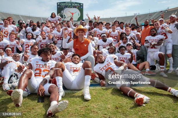 Texas Longhorns pose with the golden hat after winning the game against the Oklahoma Sooners on October 8th 2022 at the Cotton Bowl Stadium in Dallas...