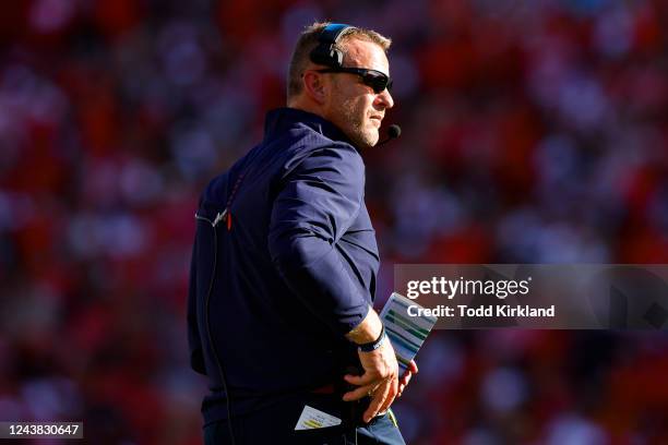 Head coach Bryan Harsin of the Auburn Tigers looks on in the first half against the Georgia Bulldogs at Sanford Stadium on October 8, 2022 in Athens,...