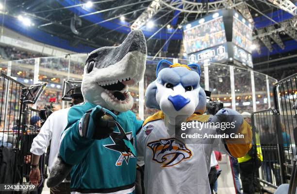 The San Jose Sharks mascot SJ Sharkie and the Nashville Predators mascot Gnash pose together during the 2022 NHL Global Series Challenge Czech...