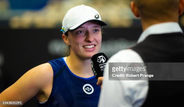 Iga Swiatek of Poland during her on-court interview after defeating Ekaterina Alexandrova of Russia in her semi-final match on Day 6 of the Agel Open...