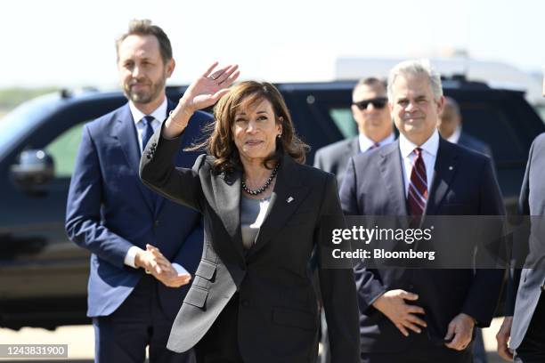 Vice President Kamala Harris, center, arrives with Travis Count Judge Andy Brown, left, and Steve Adler, mayor of Austin, at Austin-Bergstrom...