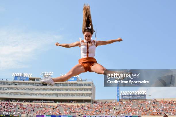 Texas Longhorns cheerleader performs during the game between the Oklahoma Sooners and the Texas Longhorns on October 8, 2022 at the Cotton Bowl...
