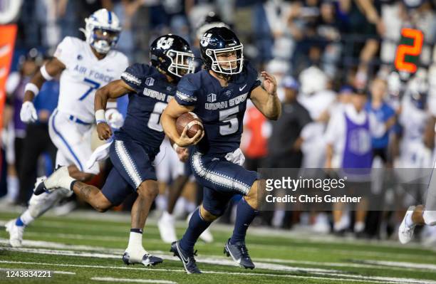 Cooper Legas of the Utah State Aggies rushes for a touchdown against the Air Force Falcons during the second half of their game October 8, 2022...