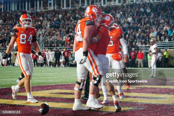 Clemson Tigers Running Back Will Shipley is congratulated by Clemson Tigers Offensive Lineman Walker Parks for scoring a touchdown during the first...