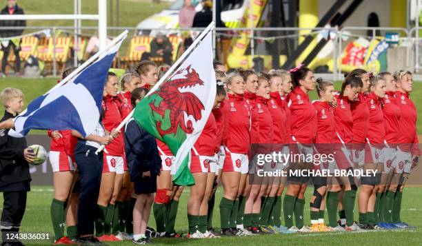 Team Wales line up for the national anthems during the New Zealand 2021 Women's Rugby World Cup Pool A match between Wales and Scotland at Northland...