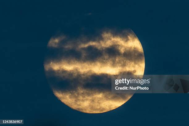 Percent illuminated waxing gibbous moon rises behind clouds in Rocca Calascio , Italy, on october 8th, 2022. The full Hunters Moon rises on Sunday...
