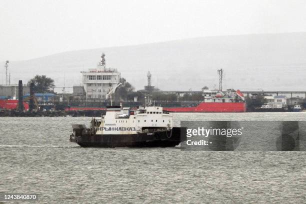 Ferry arrives at Port Crimea near Kerch after crossing the Kerch strait from Port Caucasus , Krasnodar region in southern Russia, on October 9 a day...
