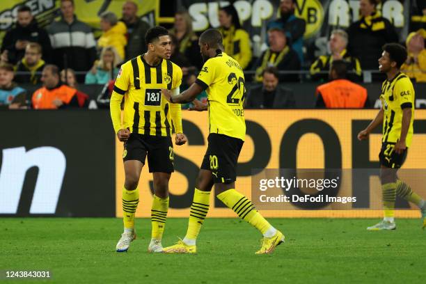 Jude Bellingham of Borussia Dortmund and Anthony Modeste of Borussia Dortmund Cheering after Anthony Modeste's of Borussia Dortmund goal to make it...