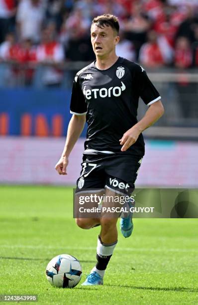 Monaco's Russian midfielder Aleksandr Golovin runs with the ball during the French L1 football match between Montpellier Herault SC and AS Monaco at...