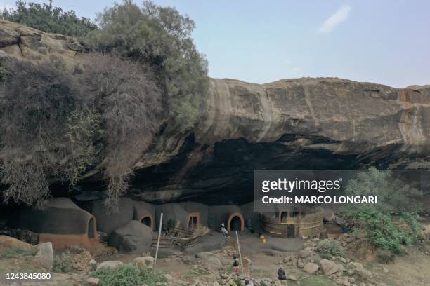 This aerial view show the Kome Caves site in the district of Berea, Lesotho, on October 9, 2022. - The caves are a mud dwelling, classified as a...