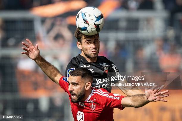 Brest's French midfielder Romain Del Castillo fights for the ball with Lorient's French defender Vincent Le Goff during the French L1 football match...