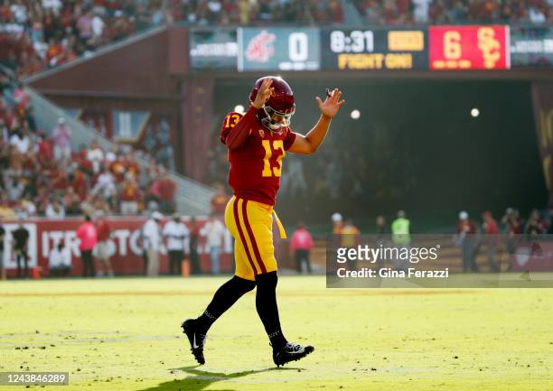 Trojans quarterback Caleb Williams reacts after the first touchdown of the game against Washington State in the first quarter at the Coliseum on...