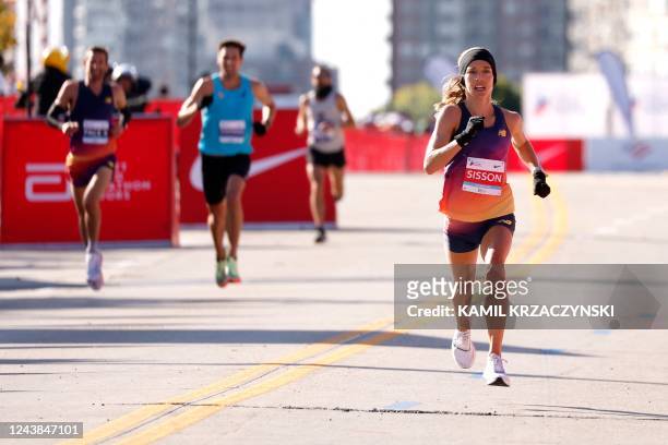 S Emily Sisson approaches the finish line to place second in the women's division of the 2022 Bank of America Chicago Marathon in Chicago, Illinois,...