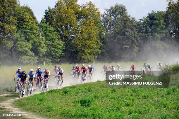 The pack rides during the first edition of the UCI Gravel World Championships 2022 between Vicenza and Cittadella, northern Italy on October 9, 2022.