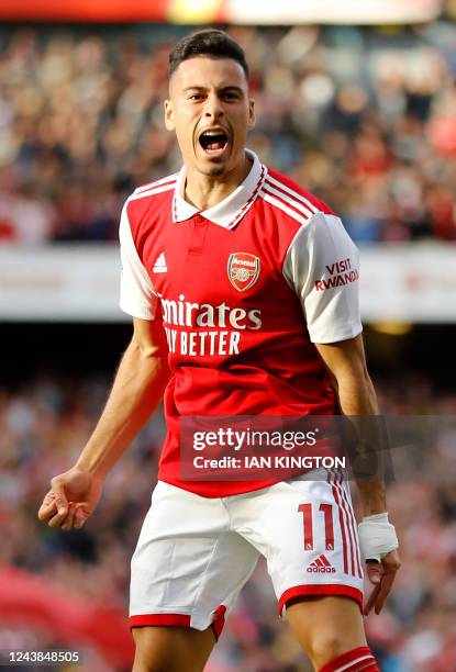 Arsenal's Brazilian midfielder Gabriel Martinelli celebrates scoring his team's first goal during the English Premier League football match between...