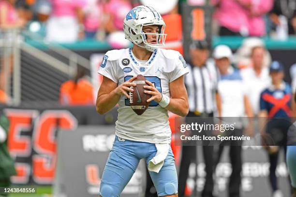 North Carolina quarterback Drake Maye looks for a receiver downfield in the second quarter as the University of Miami Hurricanes faced the University...