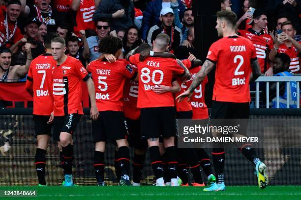 Rennes' players celebrate scoring their first goal during the French L1 football match between Stade Rennais FC and FC Nantes at The Roazhon Park...