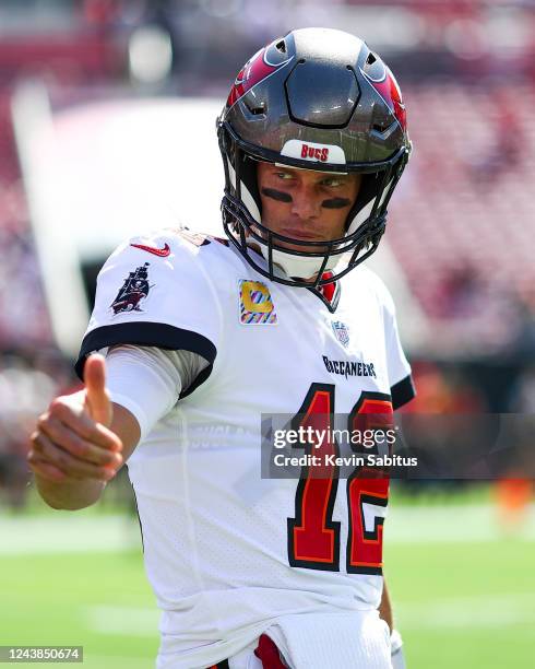 Tom Brady of the Tampa Bay Buccaneers gives a thumbs up gesture prior to an NFL football game against the Atlanta Falcons at Raymond James Stadium on...